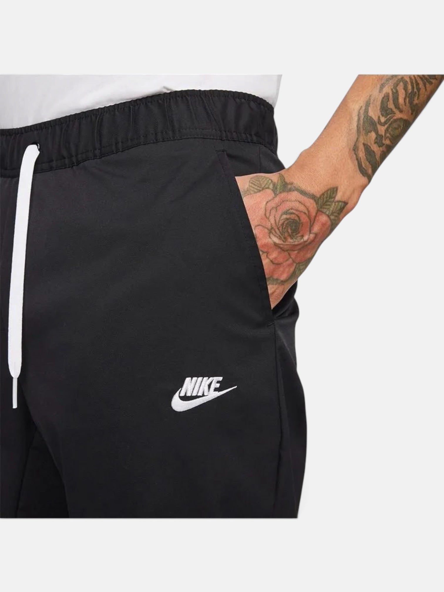 Штани чоловічі Nike Club Woven Tapered Leg Pant "Black" DX0623-010