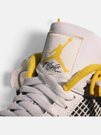 Унісекс кросівки Air Jordan 4 Retro White / Yellow AQ9129-101