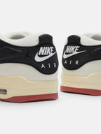 Чоловічі кросівки Air Jordan 4 RM Black / White FQ7939-100