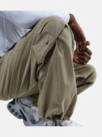 Чоловічі штани Nike Tech Woven Pants Olive HM7158-320