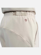 Унісекс спортивні штани Nike x NOCTA Fleece CS Open-Hem Beige FZ4675-104
