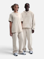 Унісекс спортивні штани Nike x NOCTA Fleece CS Open-Hem Beige FZ4675-104